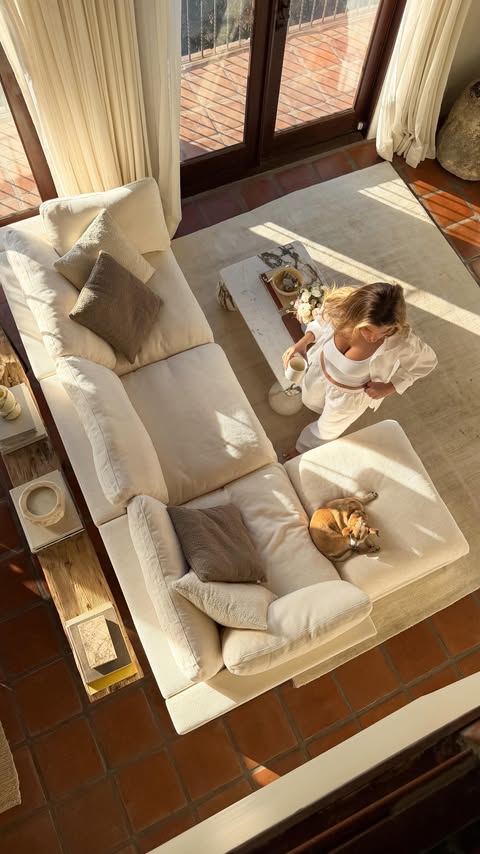 Instagram post by @karajewelll for Cozey. Caption reads: [...] your living room with the Ciello from @cozey....