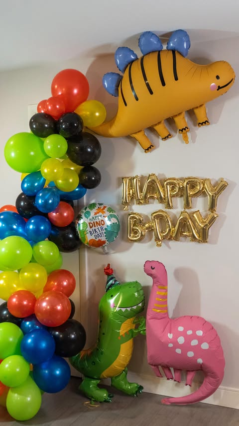 Instagram post by @joyfoodboston for Party City. Caption reads: 🦖Dino themed birthday party success🎉

We threw....