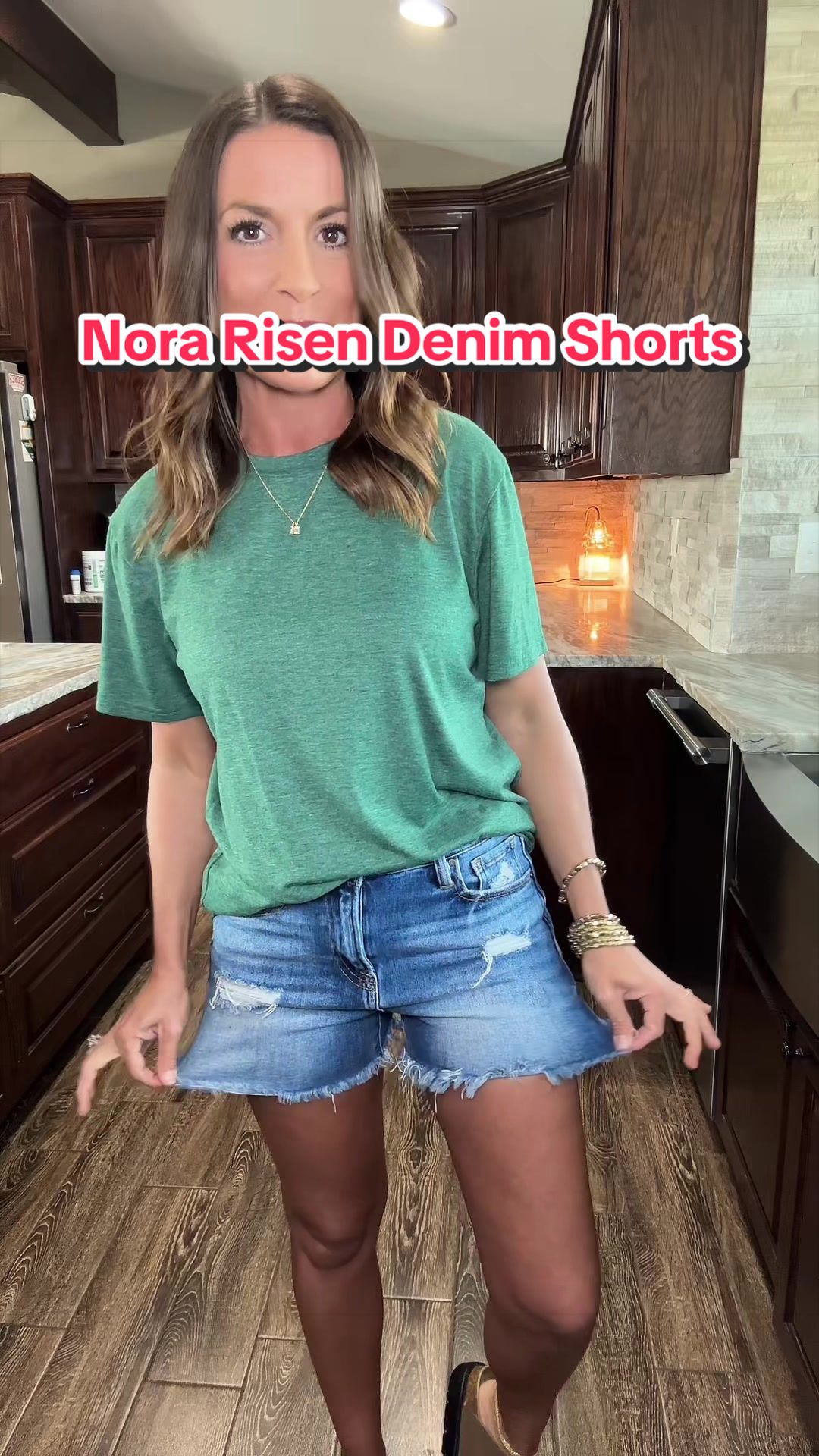 TikTok post by @kim.digital.mompr for Wild Oak Boutique. Caption reads: [...] #momshorts #shortsforwomen @Wild Oak....