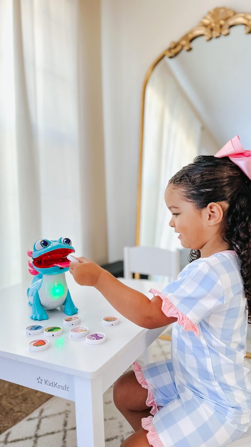 Instagram post by @baileetaylor for VTech Toys USA. Caption reads: Looking for a fun, interactive learning toy? Sandy....
