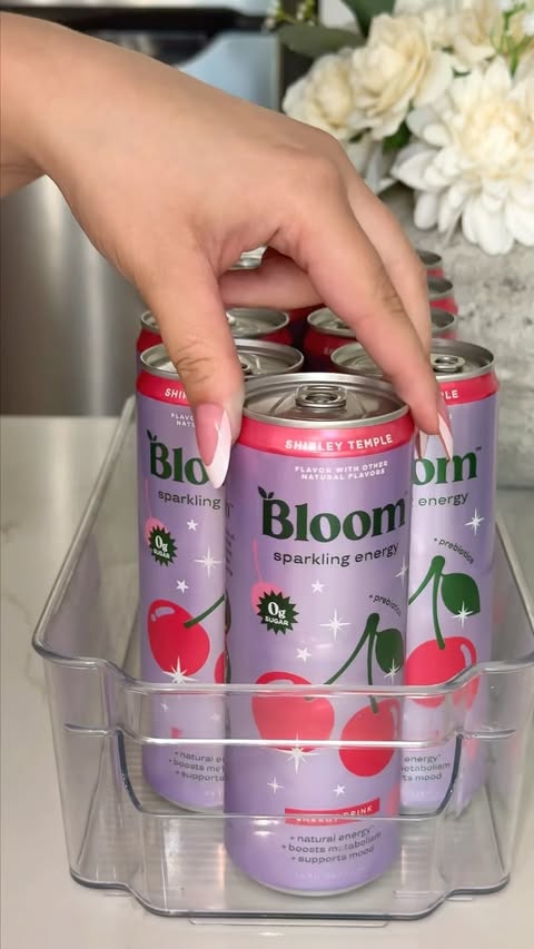 Instagram post by @lyndasedoud for Bloom Nutrition. Caption reads: Purple Restock 💜🪻🫧 Comment “purple “ for Links....