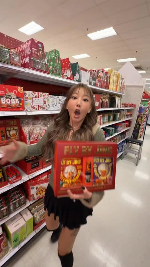 Instagram post by @allcapskat for FLY BY JING. Caption reads: 🚨🚨Attention holiday hos!! Fly By Jing Noodle +....