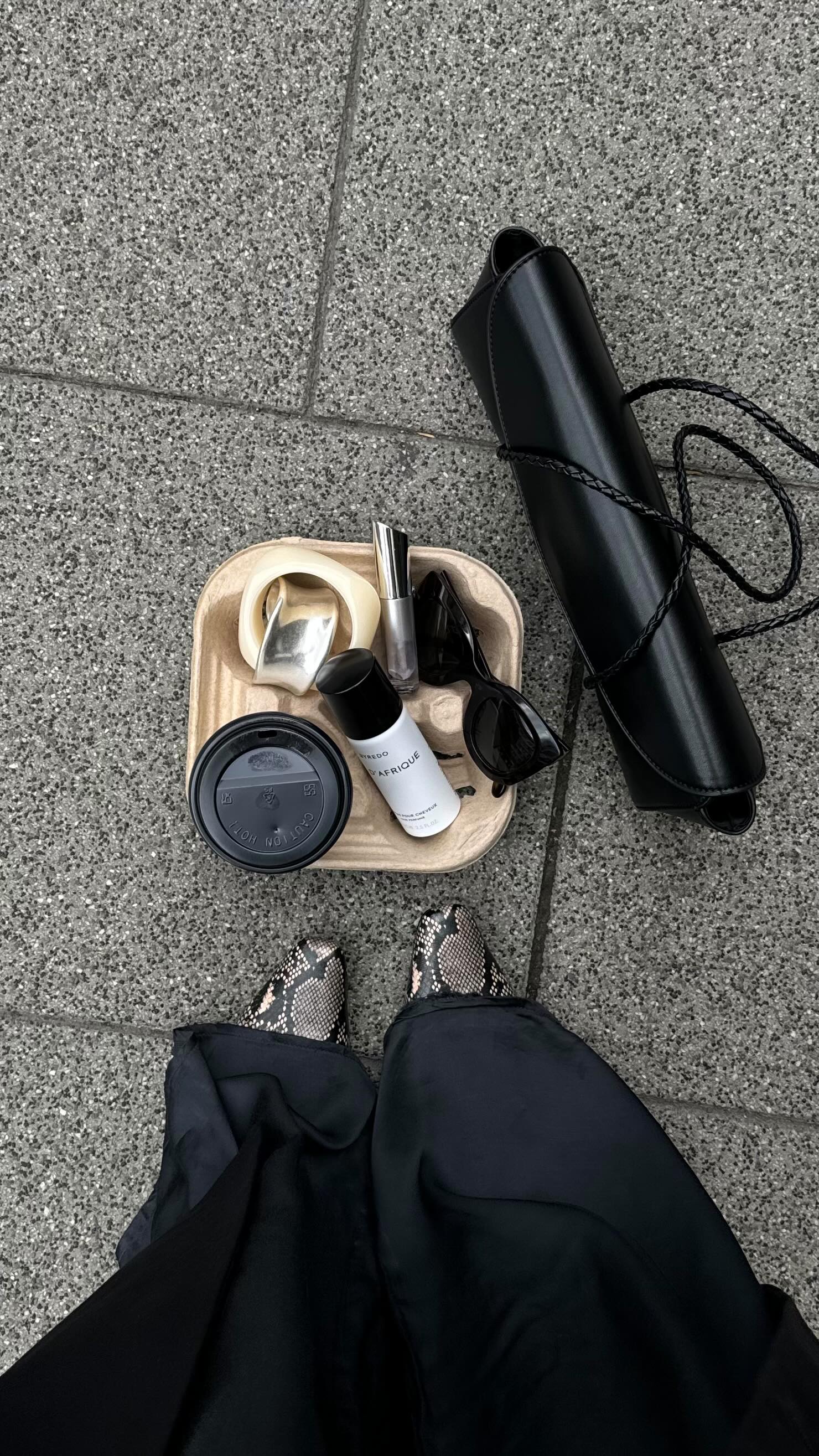 Instagram post by @joyeuseapolline for Lancaster. Caption reads: PR HAUL | dream bags, fall fashion & new makeup 🍂....