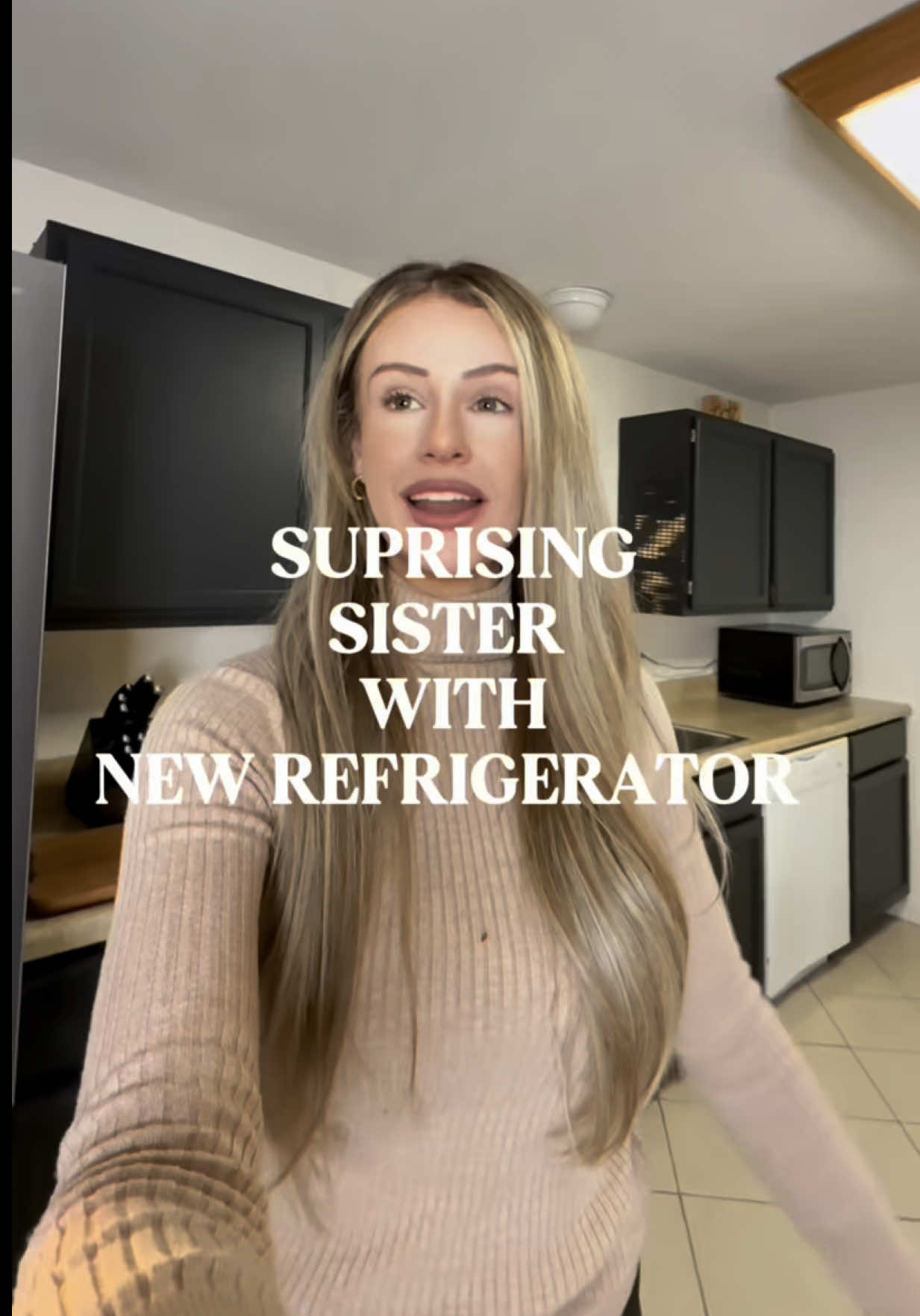 TikTok post by @kolbyshae for Lowe's. Caption reads: Surprised my sister with the ultimate kitchen....