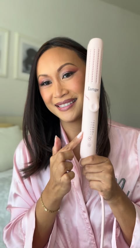 Instagram post by @themelissalifestyle_ for L’ange Hair. Caption reads: [...] is an understatement ✨ #langehair #hairtools....