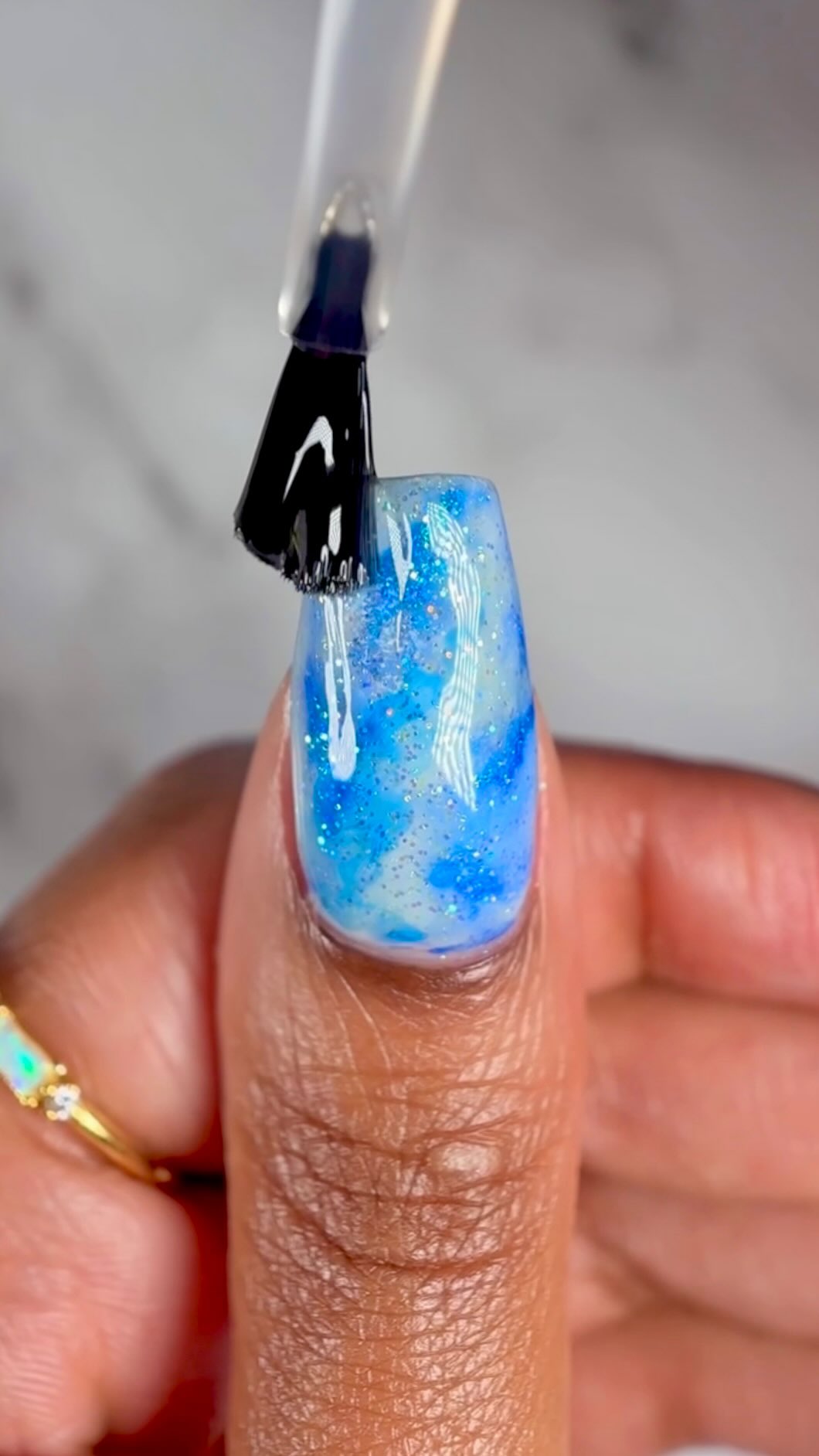 Instagram post by @suziemoon626 for Cirque Colors. Caption reads: 💙🦋 Blue Marble Nail Art 🦋💙

@cirquecolors....