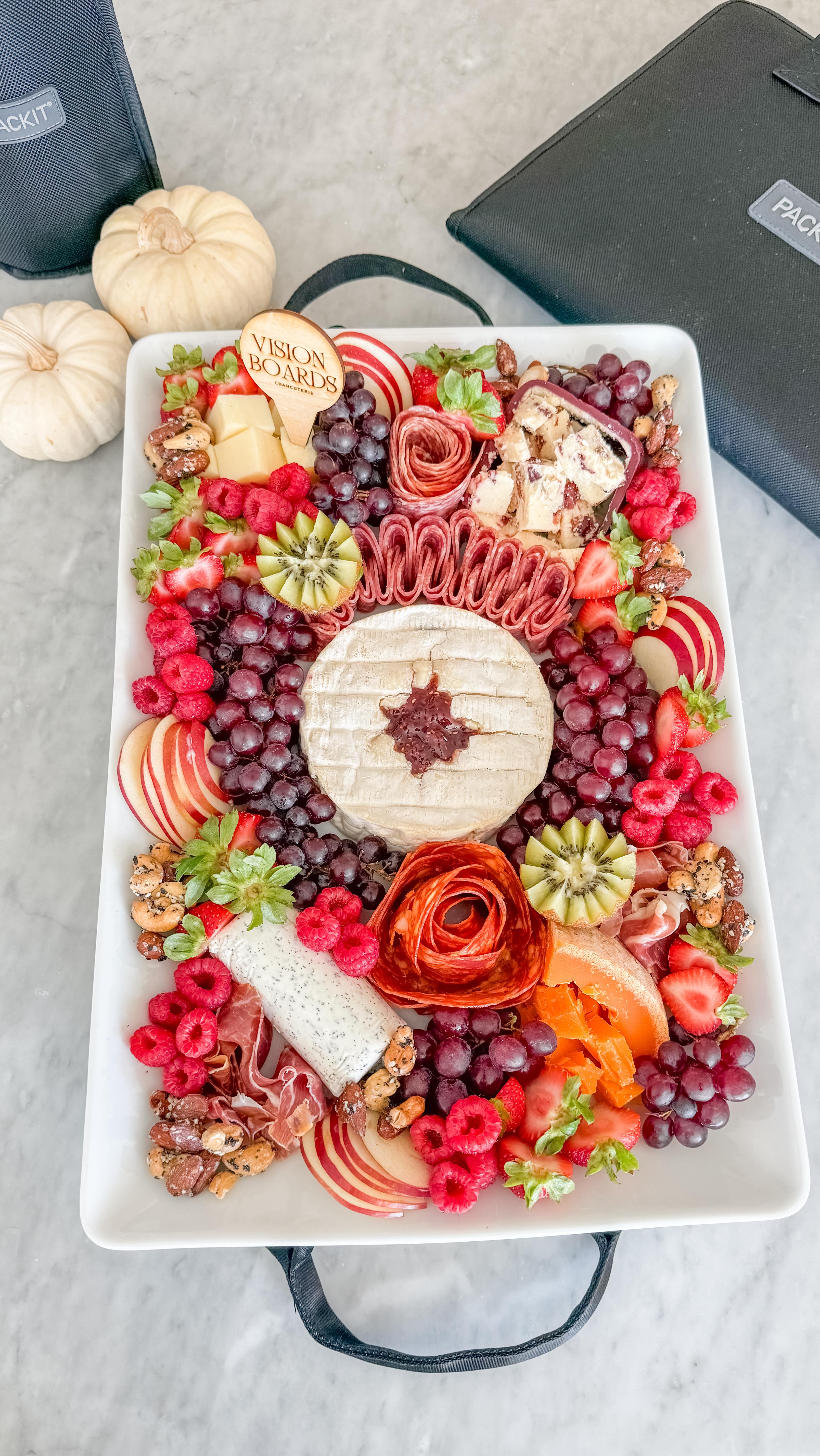 Instagram post by @visionboardscharcuterie for PackIt. Caption reads: [...] cozy Fall charcuterie 🧀✨ Thanks to the....
