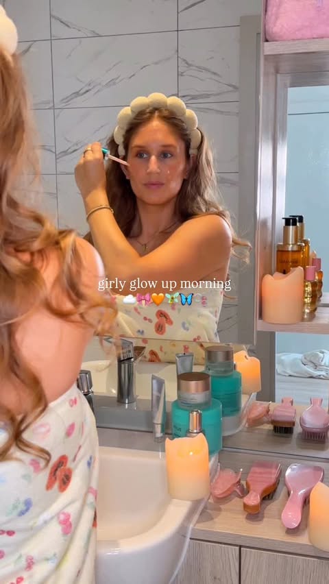 Instagram post by @byemmaleah for OUAI. Caption reads: [...] ☁️🎀🧡🧚‍♂️🦋🫧 products @theouai scalp +....