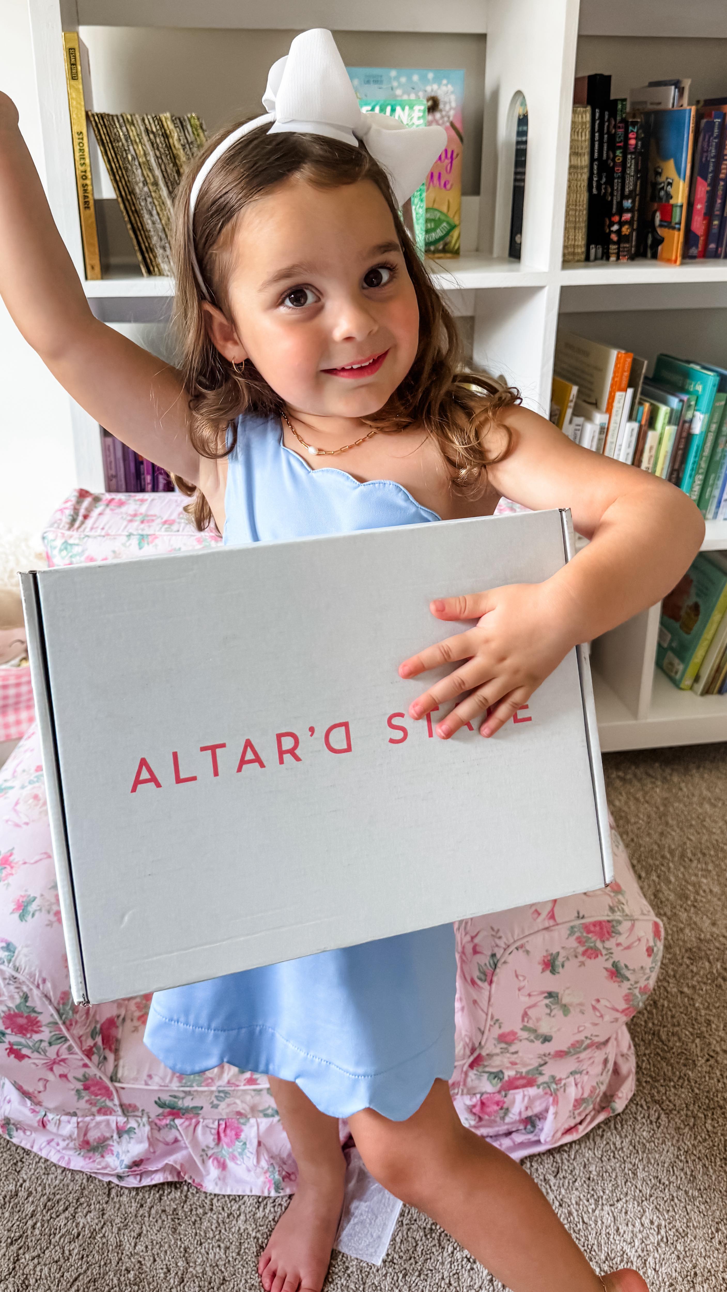 Instagram post by @cheyennedramsey for Altar'd State. Caption reads: The tiniest PNM got a “big girl” rush box from....