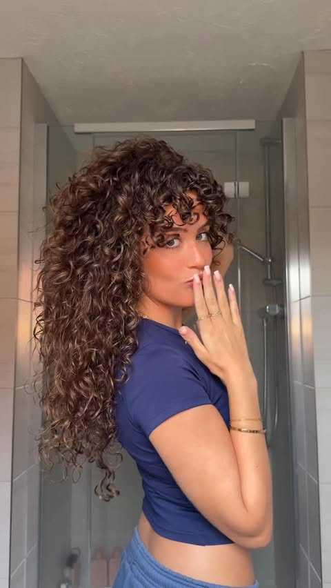 Instagram post by @libsherratt for CURLSMITH. Caption reads: [...] absolute go-to product for me<3 shop....