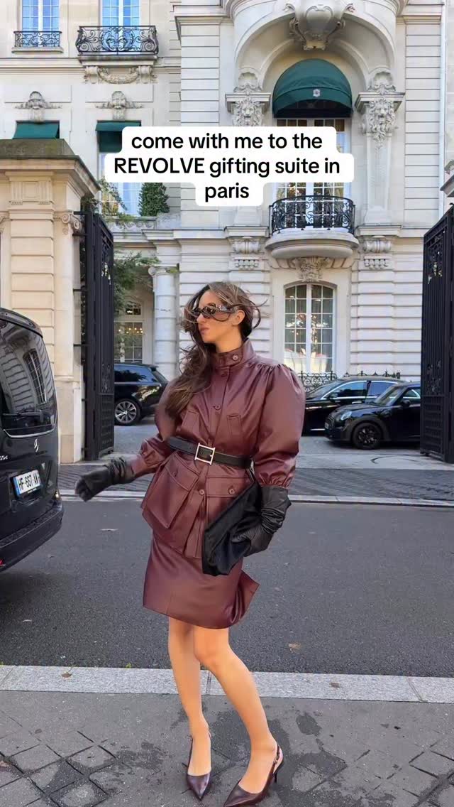 Instagram post by an influencer for REVOLVE. Caption reads: the @revolve gifting suite in paris was a [...].