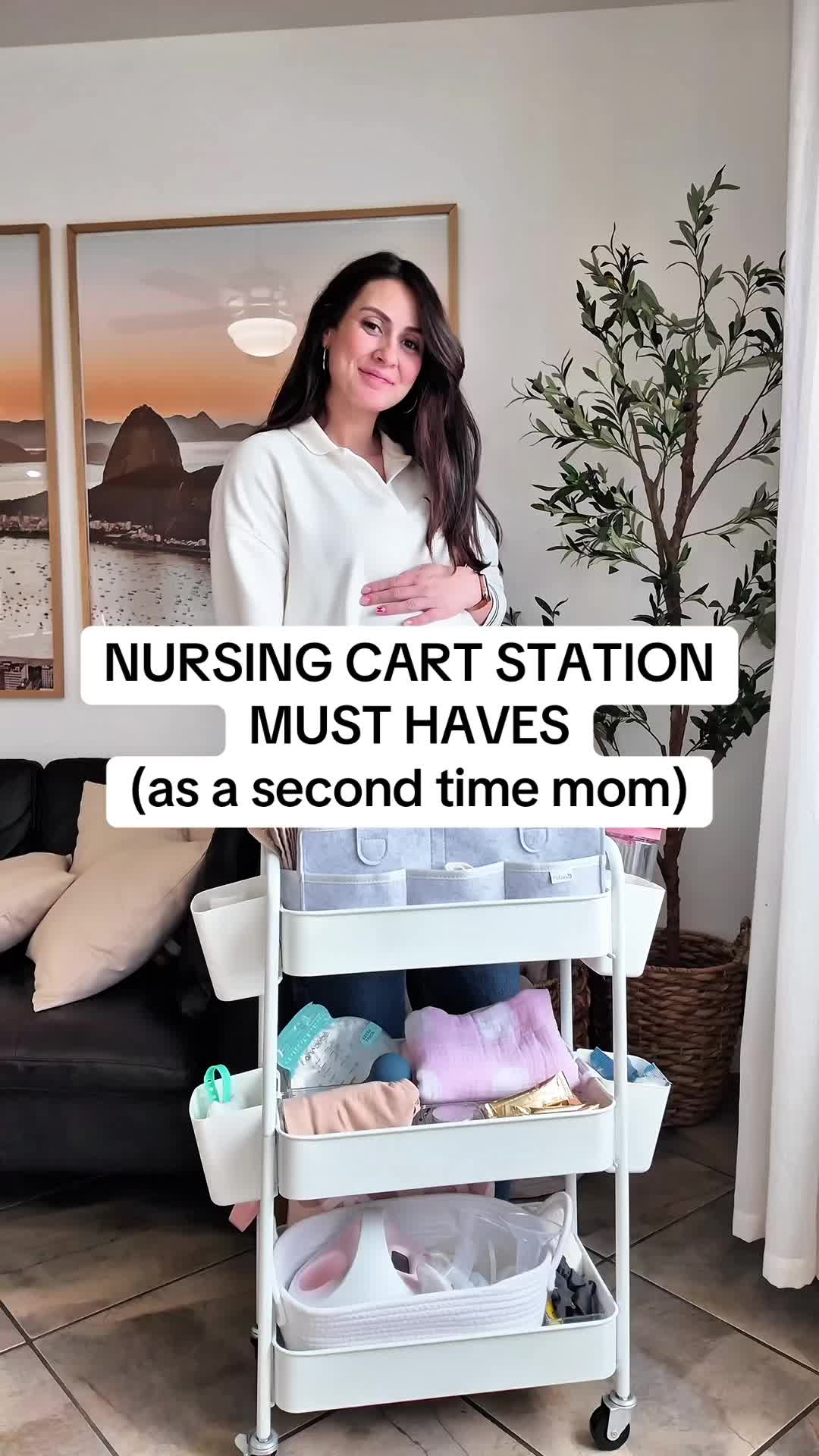 TikTok post by @stef.ferraz for Boobie Superfoods. Caption reads: Having a nursing cart (your nursery on the wheels)....