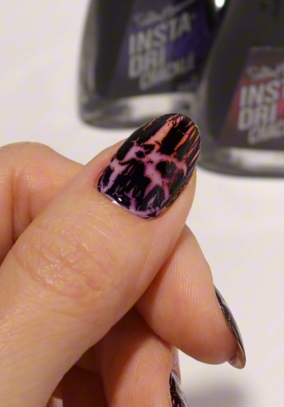 TikTok post by @hannahroxit.com for Sally Hansen. Caption reads: Is crackle back?? I used Nether and Rift from....