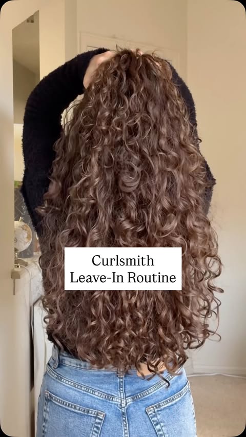 Instagram post by @kurlswkels for CURLSMITH. Caption reads: [...] to hydrating the curls in 2026 🥂🧴....