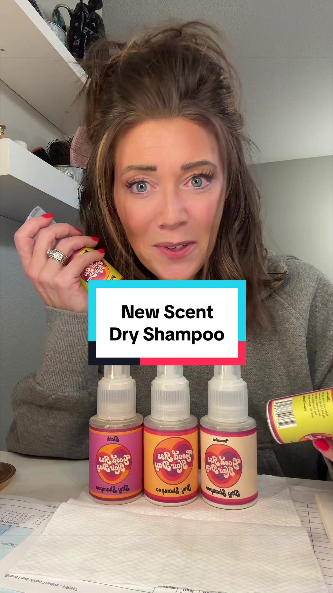 TikTok post by @ashmartodam for Good Ass Hair Day. Caption reads: [...] hair down. This dry shampoo by. @Good Ass....