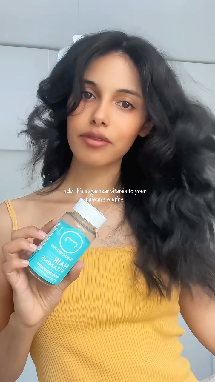 Instagram post by @kindaareum for SugarbearPRO. Caption reads: [...] biotin Hair growth gummies 💙🧸✨....