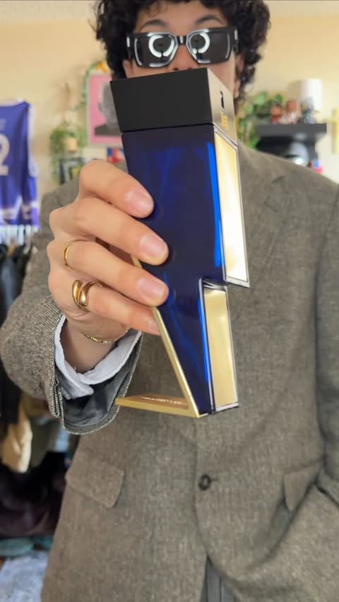 Instagram post by @rayjhuerto for Carolina Herrera. Caption reads: [...] it, smell expensive anywhere with....