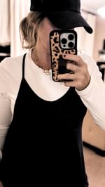 Instagram post by @nickibthomas for Walli Cases. Caption reads: [...] a l w a y s trending! 💋 This cheetah....