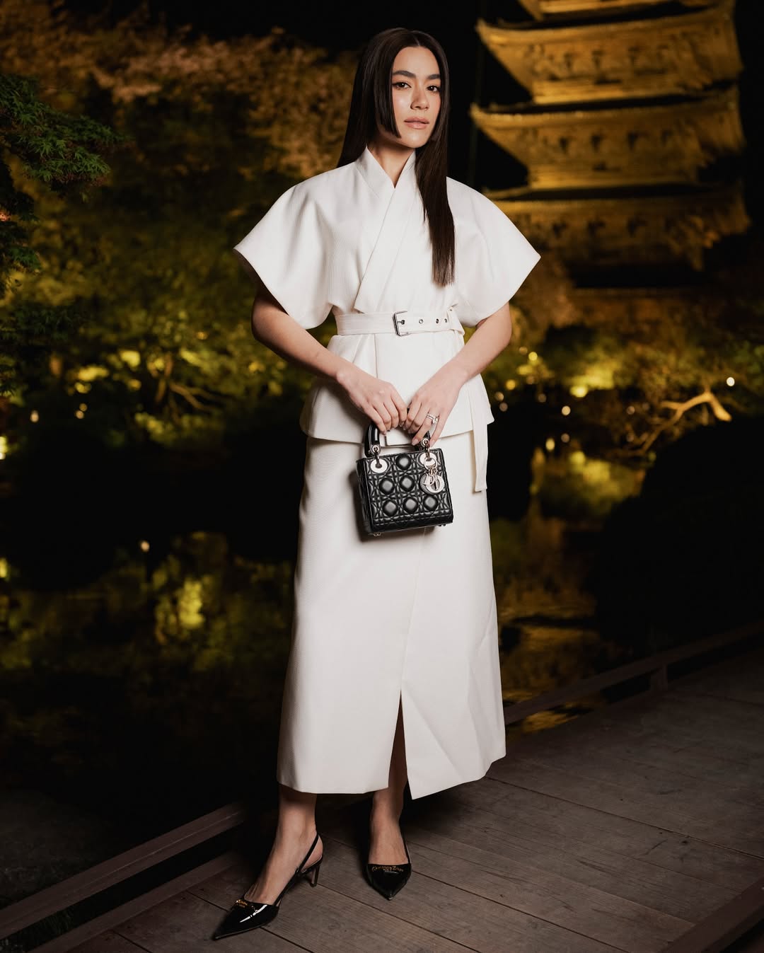 Instagram post by @kimmy_kimberley for Dior. Caption reads: A vision in white wearing a look from the new....