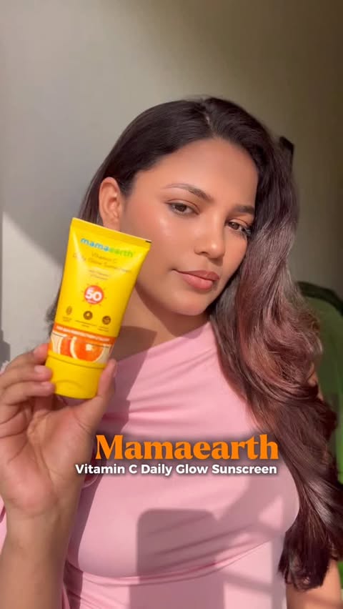 Instagram post by @madhavisisodia for Mamaearth. Caption reads: [...] day long. 🍊💛 #GlowOn #SPFEveryday....