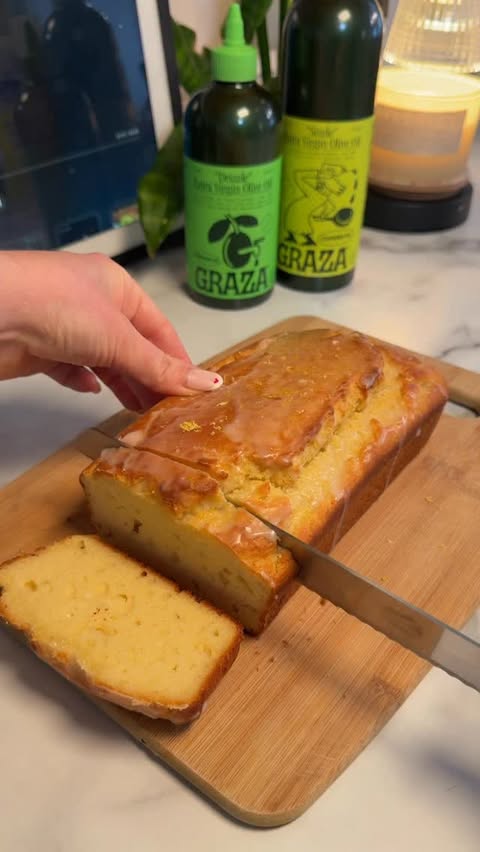 Instagram post by @reviskitchenn for Graza. Caption reads: Lemon olive oil bread 🍋🍞😋 #grazapartner Bread:....