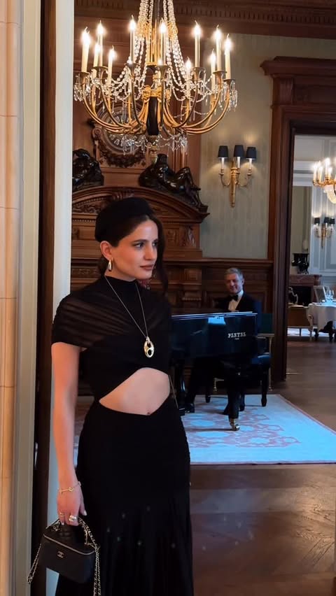 Instagram post by @sevaoli for APM Monaco. Caption reads: [...] Jaya Maxi Dress / XS Jewellery: @apmmonaco....
