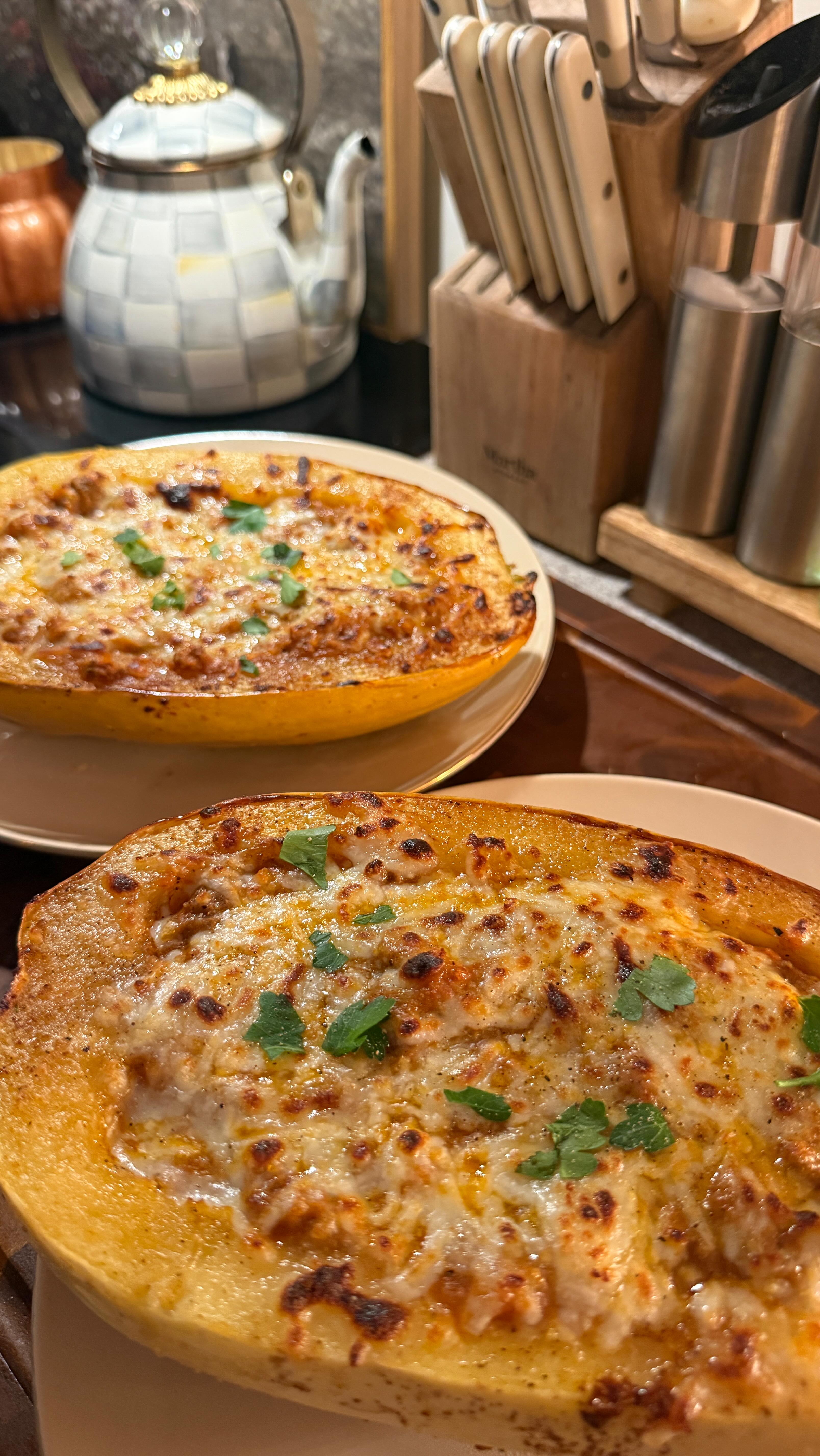 Instagram post by @jesscostantino for ButcherBox. Caption reads: these spaghetti squash bowls make for the perfect....