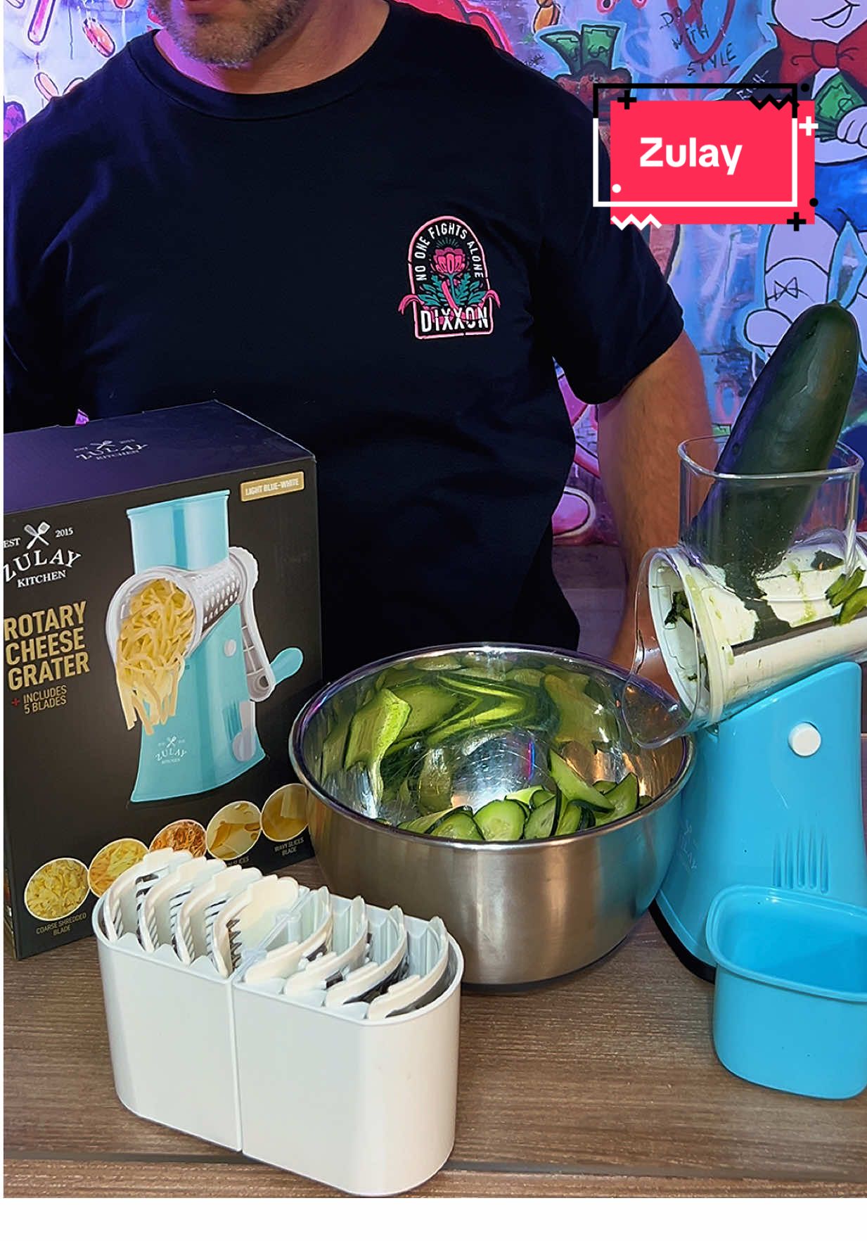 TikTok post by @19battlecat82 for Zulay Kitchen. Caption reads: Zulay Kitchen Rotary Cheese Grater - Manual Cheese....