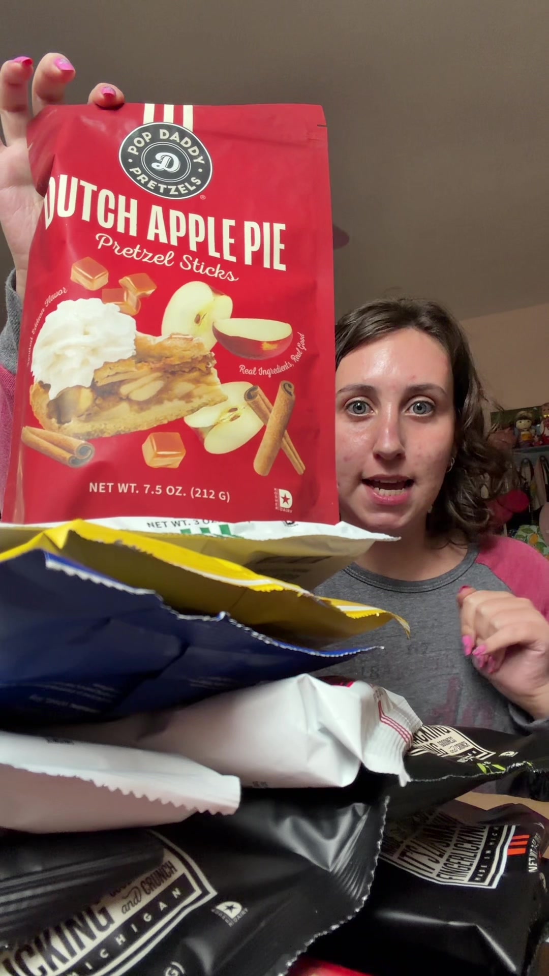 TikTok post by @miss.sarcasm_ for Popdaddy Snacks. Caption reads: Watch me eat a whole bag in five minutes flat....