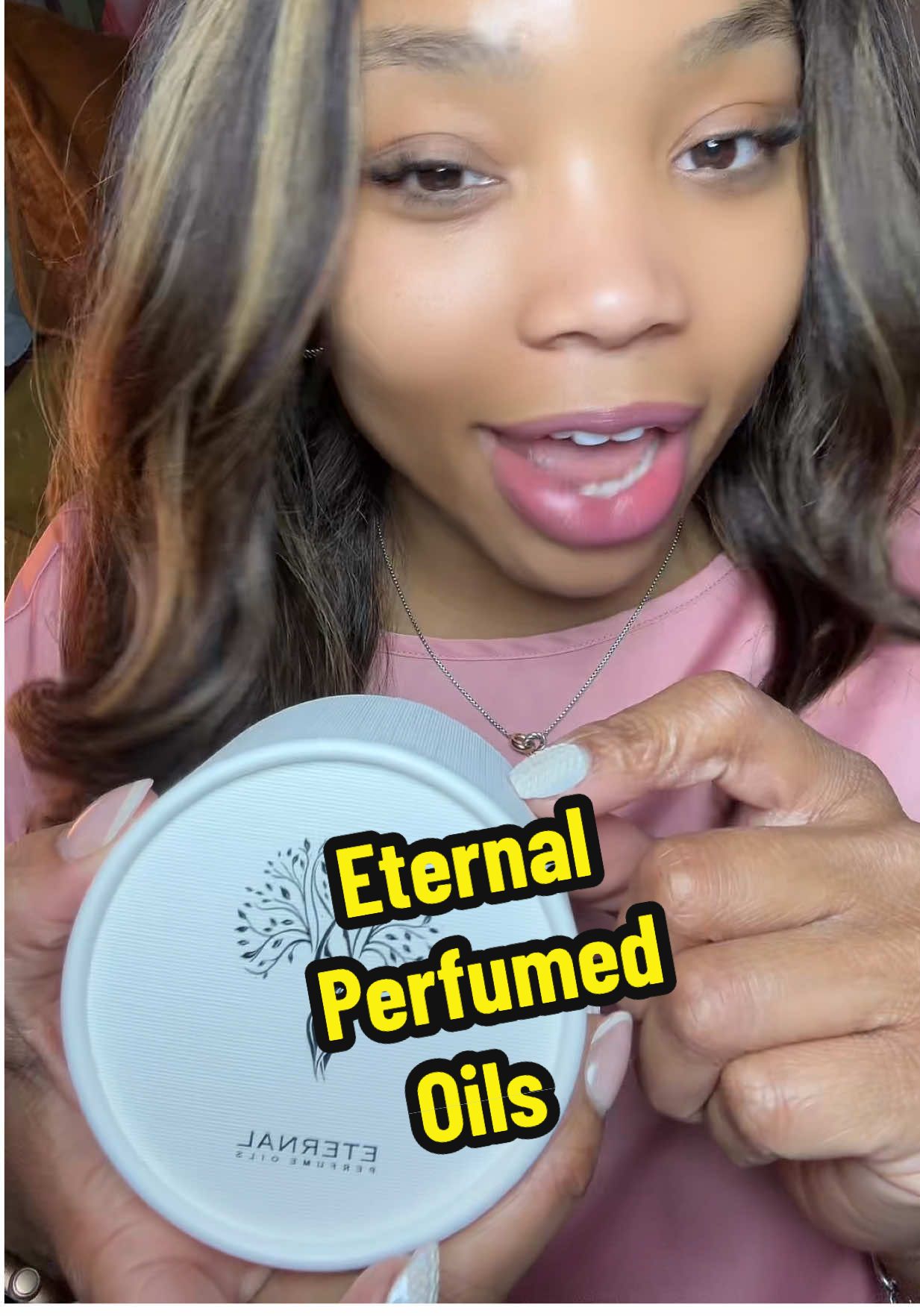 TikTok post by @lifeintheashlane for Eternal Perfume Oils. Caption reads: [...] try multiple fragrances at once. @Eternal....