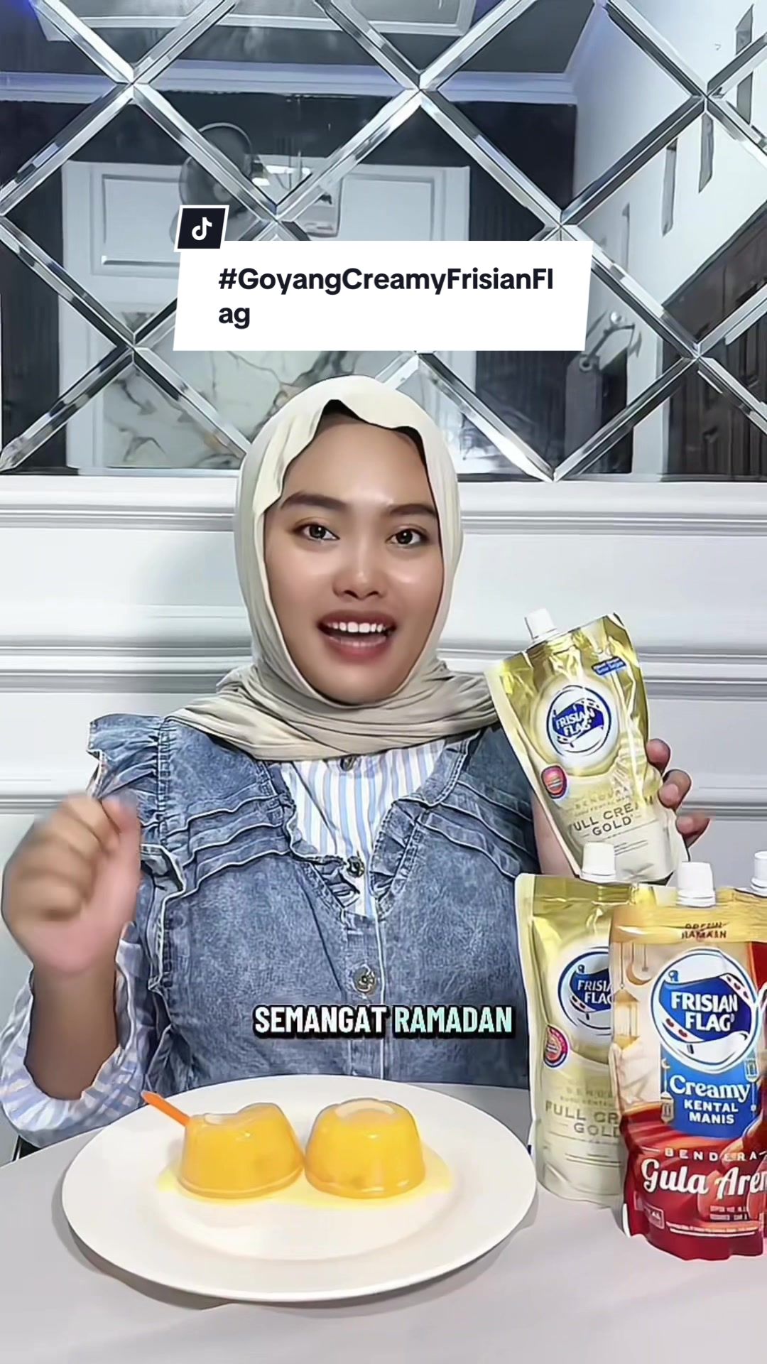 TikTok post by @novaurbaa_ for Frisian Flag Indonesia. Caption reads: @Frisian Flag #GoyangCreamyFrisianFlag Challege....