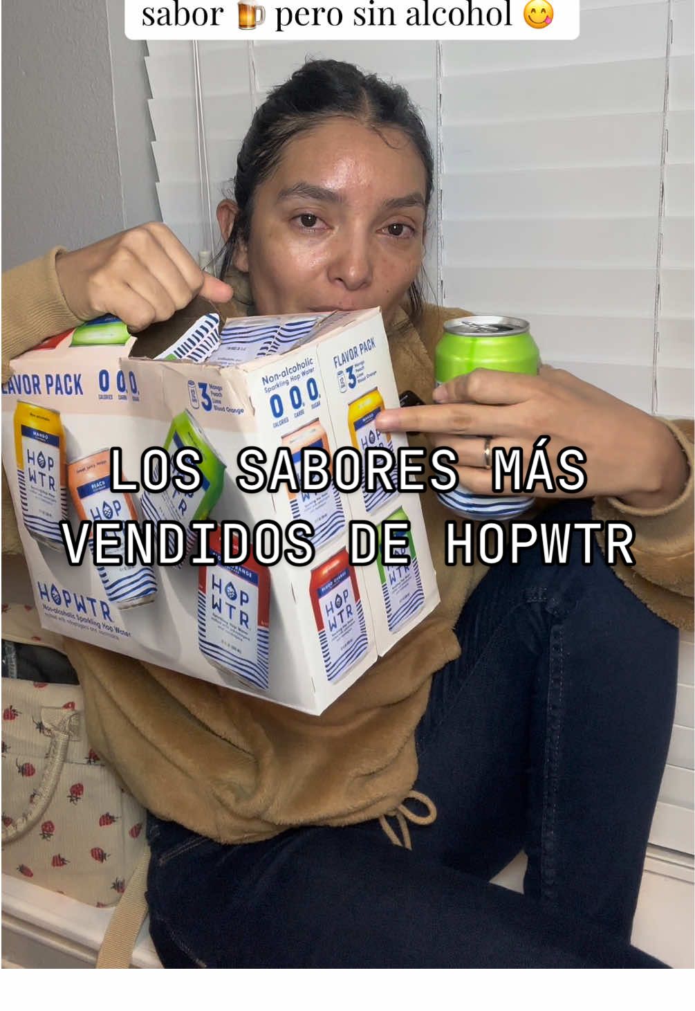 TikTok post by @contentbyclaudia for Hopwtr. Caption reads: Relájate con @HOP WTR #hopwtr #sinalcohol....