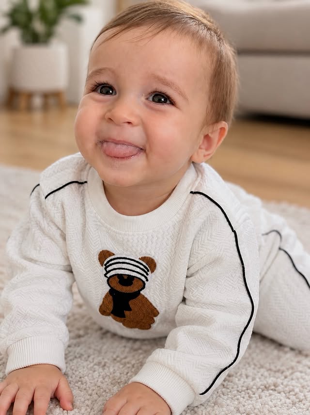 Instagram post by @denysvibes for Miniolie. Caption reads: Cozy little moments in MiniOlie 🤍🦁 Use code....