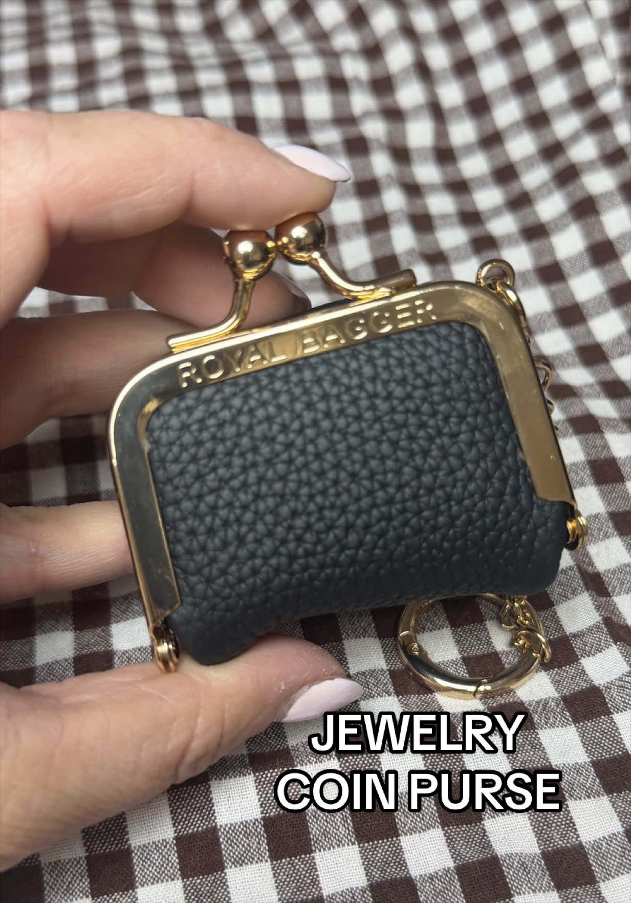 TikTok post by @katiee_mayy for Royal Bagger. Caption reads: [...] the go, perfect for traveling too! @ROYAL....