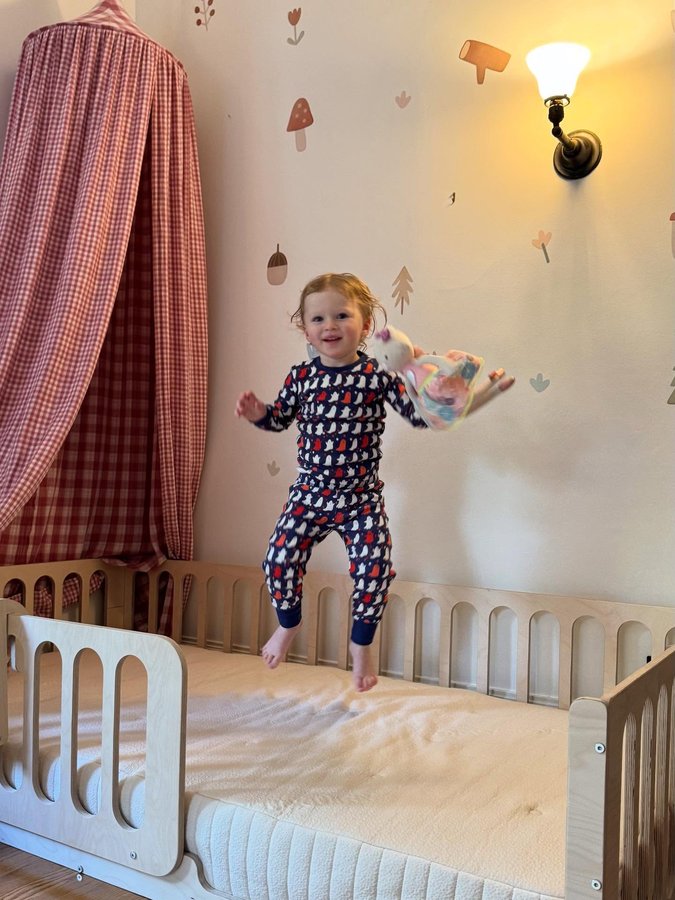 Instagram post by @irelandirelandireland for Avocado Green Mattress. Caption reads: Bb finally got her own big girl mattress! I am....