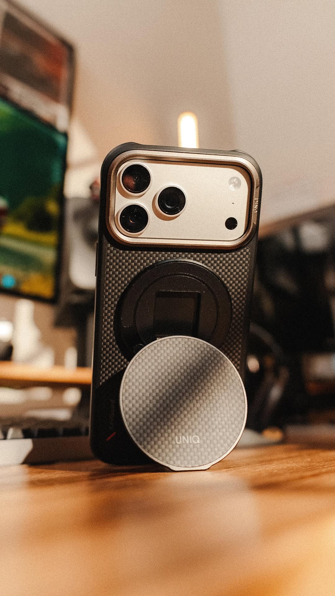 Instagram post by @cj.filmed.it for Uniq Better By Design. Caption reads: If you’re gonna protect your phone, you might as....