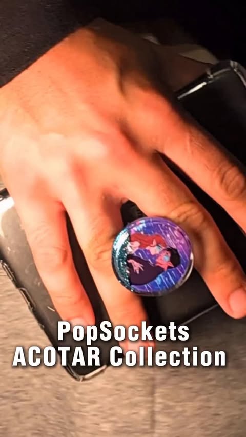 Instagram post by @burningcauldronfitness for PopSockets. Caption reads: ATTENTION ALL ACOTAR FANS!!! @popsockets just....