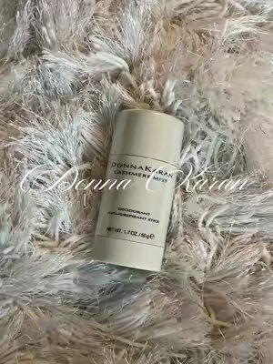 TikTok post by @loveofaniah for Donna Karan New York. Caption reads: @Donna Karan Beauty 🎀 #fragrancetiktok....