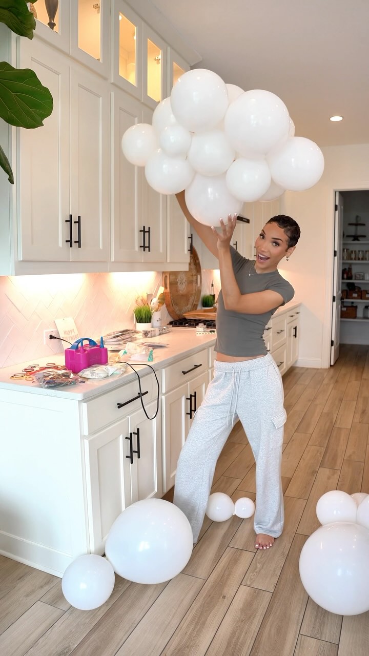 Instagram post by @ravenelyse for Michaels Stores. Caption reads: #AD Balloons are such a simple yet impactful way....