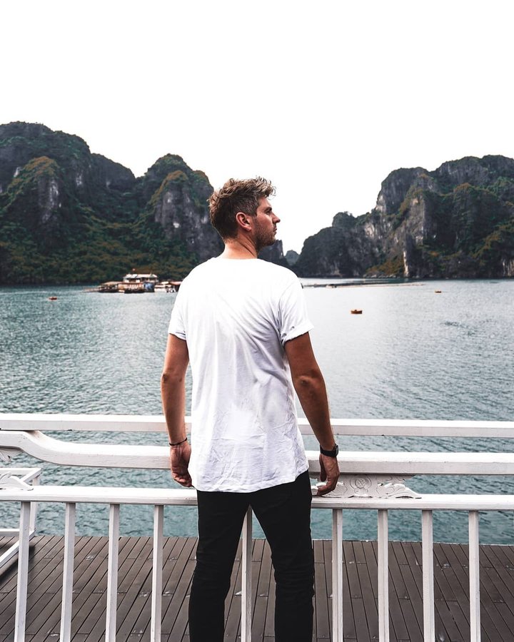 Instagram post by @explorewithlee for Passion Passport. Caption reads: Ha Long Bay is one of those places you always see....