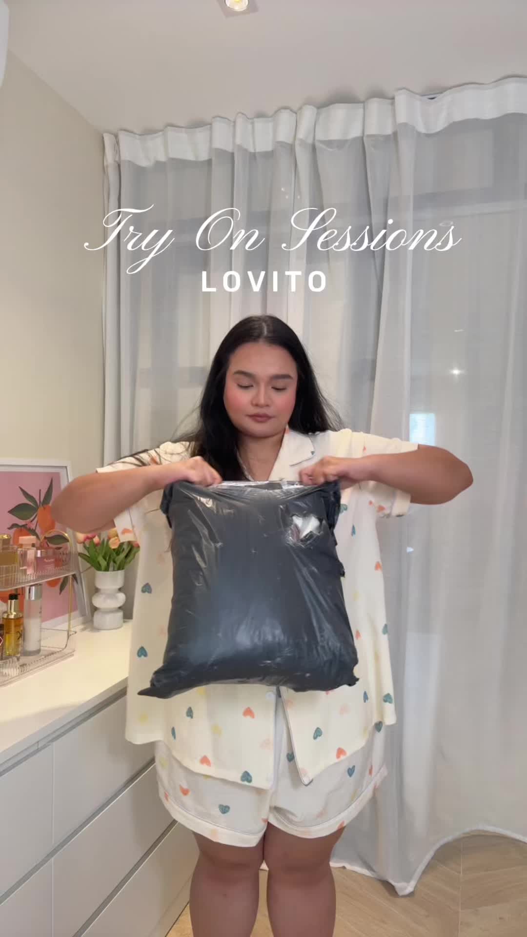 TikTok post by @thatsmikka for Lovito. Caption reads: [...] tops. Love this little haul of items I got....