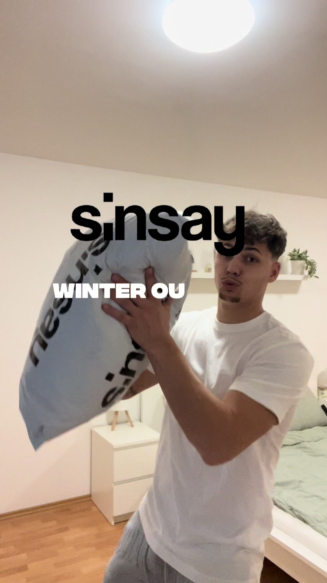 TikTok post by @erikk35 for Sinsay. Caption reads: WINTER OUTFITS 🥶#reklama #sinsay....