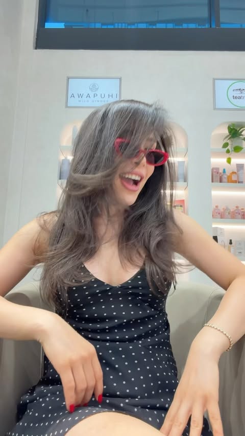 Instagram post by @selmacicekdal for amika. Caption reads: Chronic outfit & hair & red nails repeater ❤️....