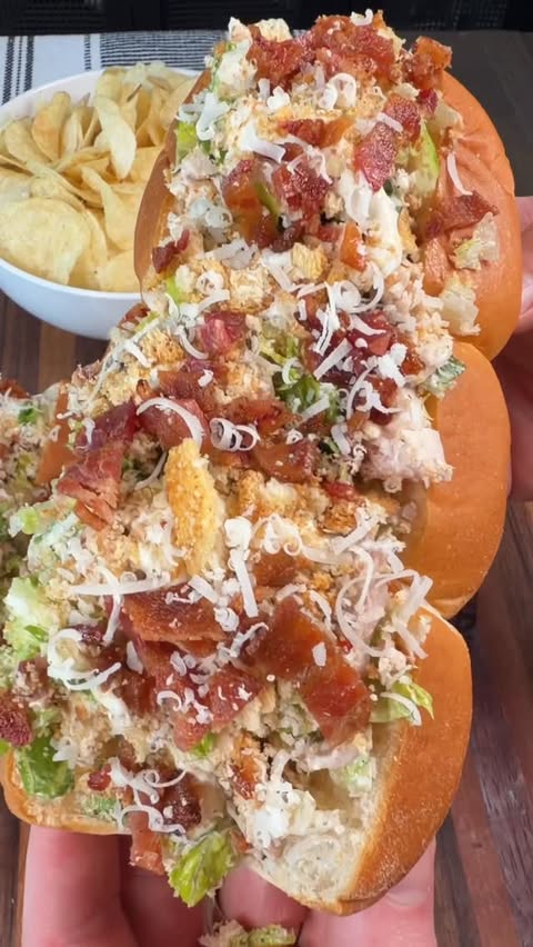 Instagram post by @cookinginthemidwest for KING'S HAWAIIAN. Caption reads: [...] Chicken Caesar Salad Sandwiches on....