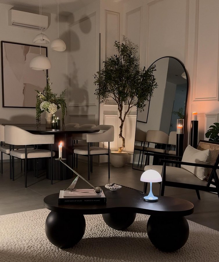 Instagram post by @interior.ela for Botané. Caption reads: [...] Lounge chair Manuell Flower bouquet from....