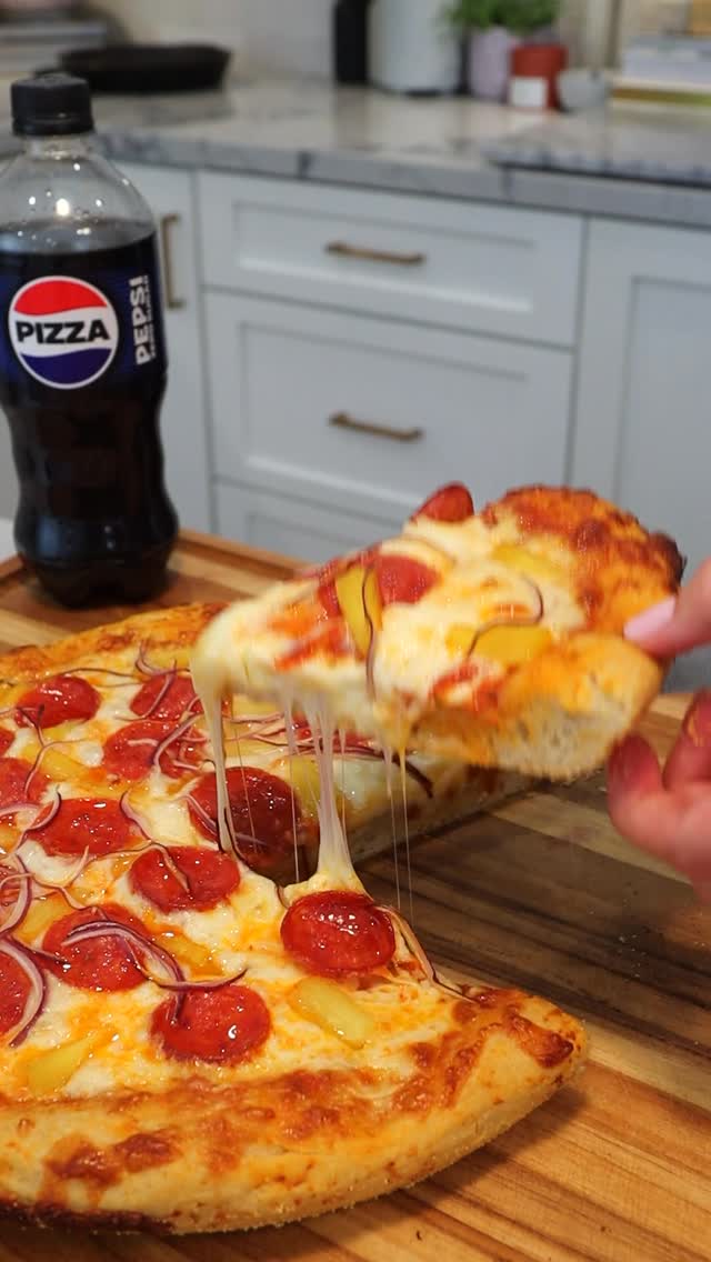 Instagram post by @erinnobrienn for pepsi. Caption reads: Are you team pineapple or no pineapple on pizza!?....