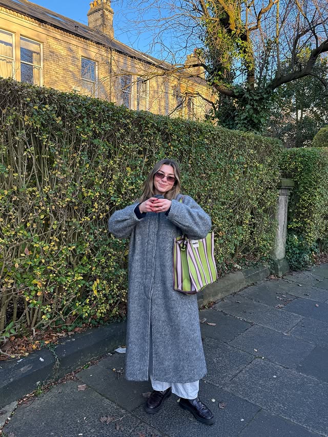 Instagram post by @ambstorey for A.KJÆRBEDE. Caption reads: taking the new @bagsbymonty for a spin 🥝 bag....