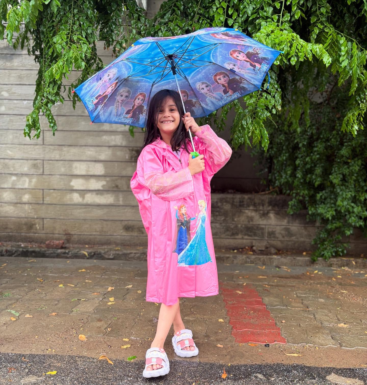 Instagram post by @piyadeeps_vraddhi for Babyhug. Caption reads: #collaboration with @firstcryindia
Rain dance....
