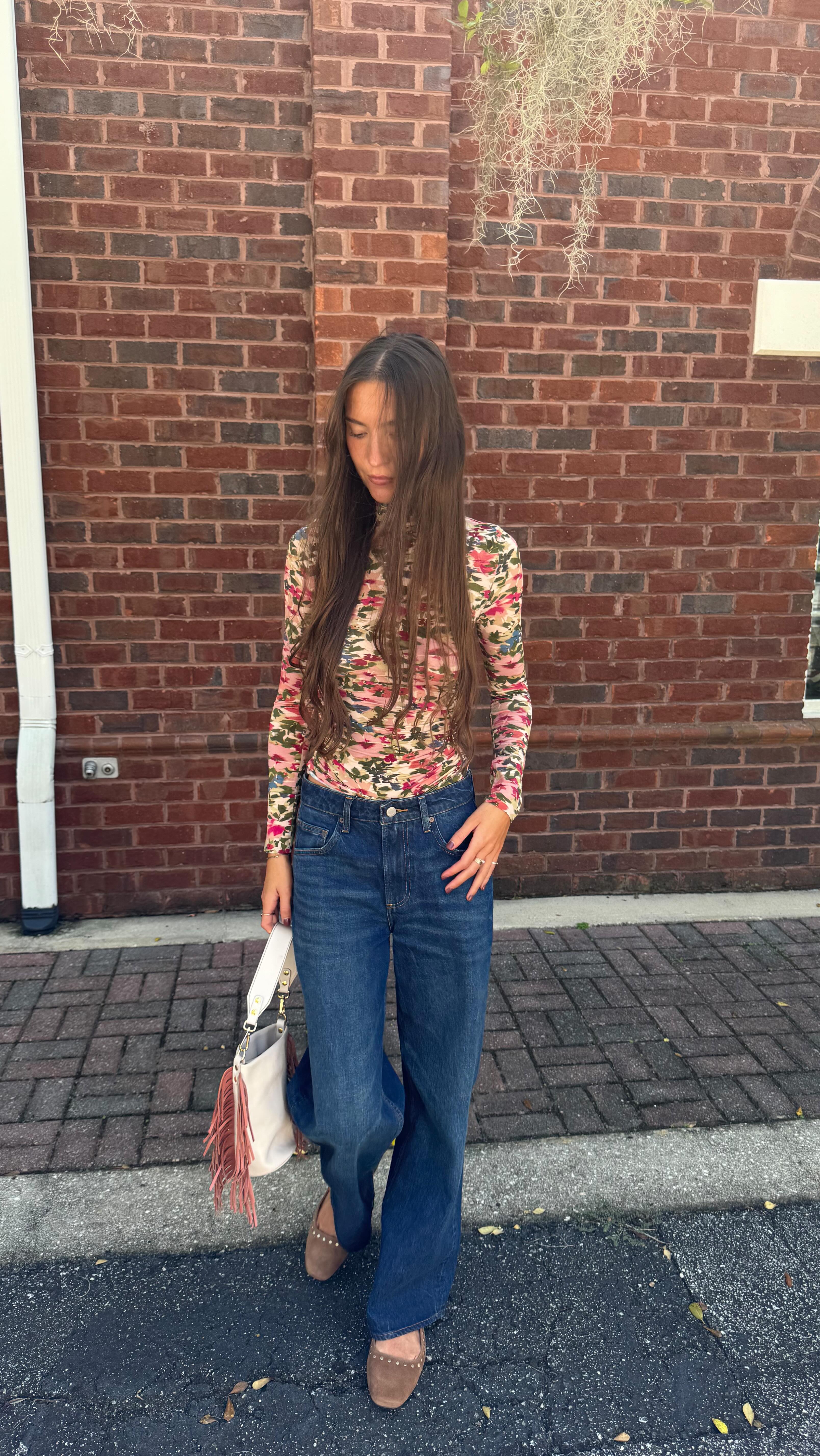 Instagram post by @mimimythen for FARM Rio. Caption reads: layering and loving @farmrio #farmrio.