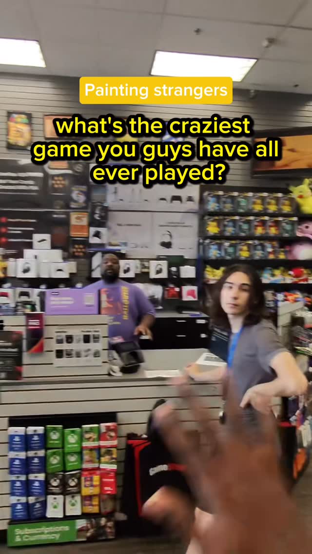 Instagram post by @michaelartisma for GameStop. Caption reads: He was WAITING for this moment😳 #artisma....